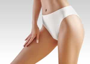 A cropped shot of a woman in white underwear after ThermiVa in Edmond, OK