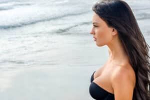 A cropped shot of a woman’s chest after breast augmentation in Oklahoma